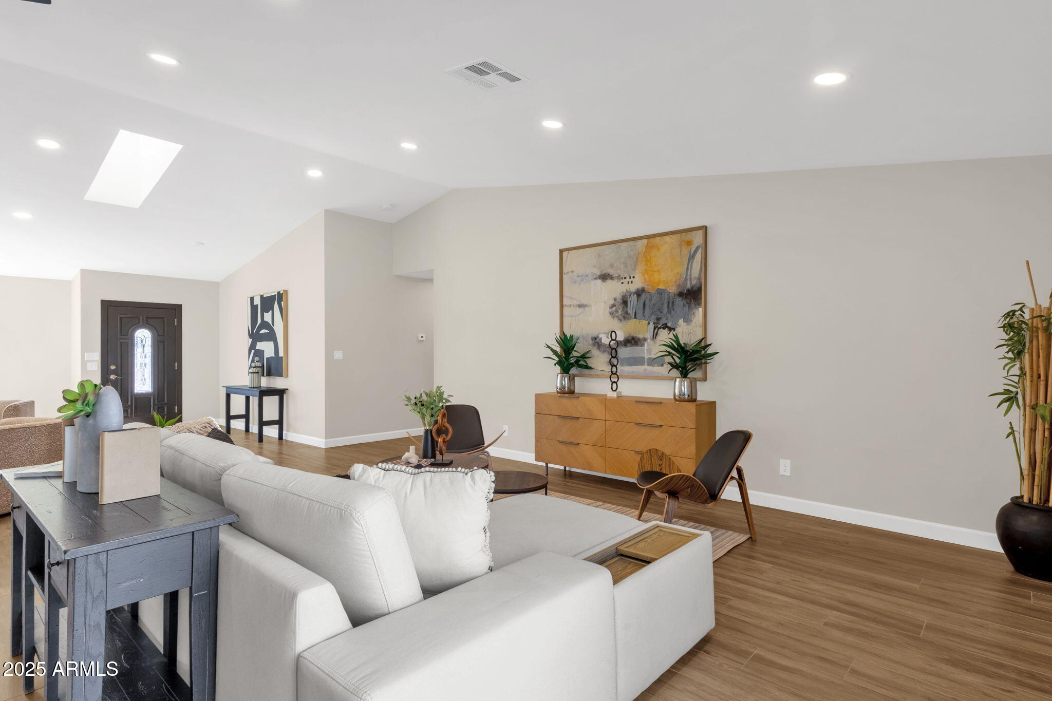 2276 East Mercer Lane Phoenix, AZ 85028 - Photo 23 of 61 a living room with furniture and wooden floor