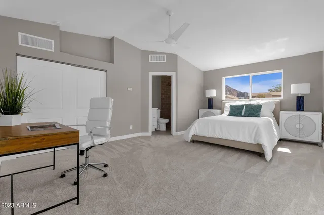 a view of storage and utility room with washer and dryer