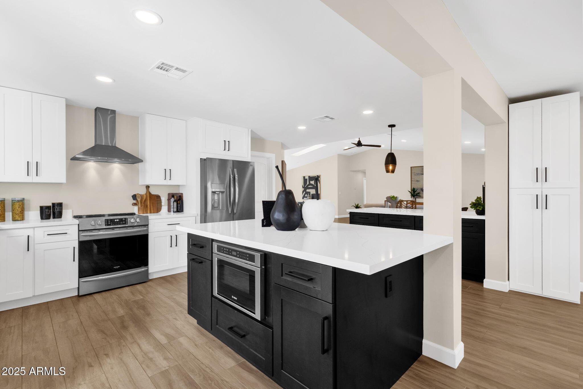 2276 East Mercer Lane Phoenix, AZ 85028 - Photo 28 of 61 a kitchen with a sink stove and refrigerator