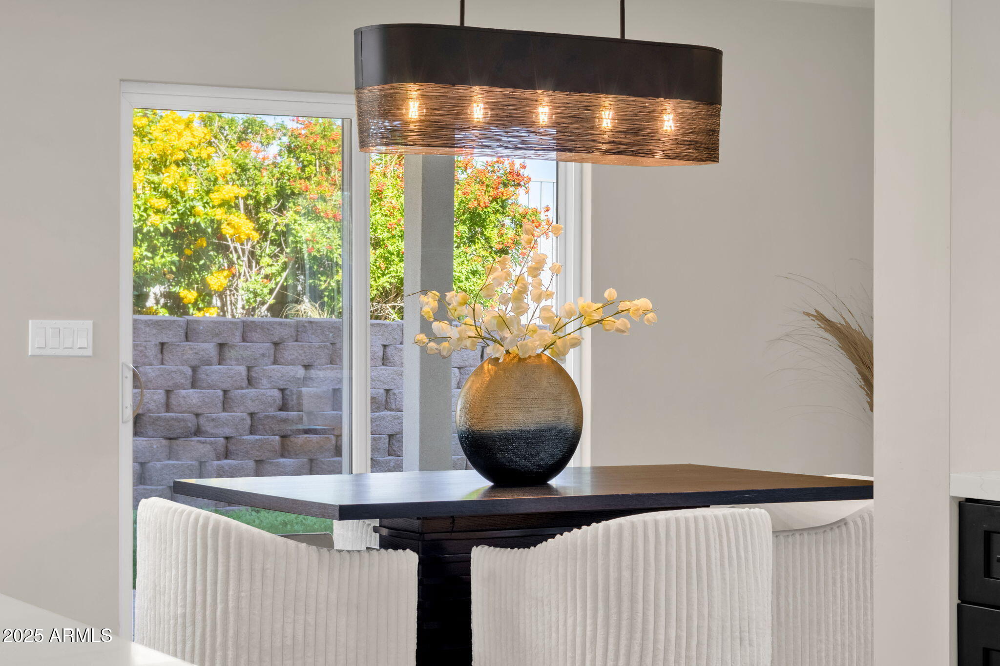 2276 East Mercer Lane Phoenix, AZ 85028 - Photo 35 of 61 a vase of flowers sitting on a table