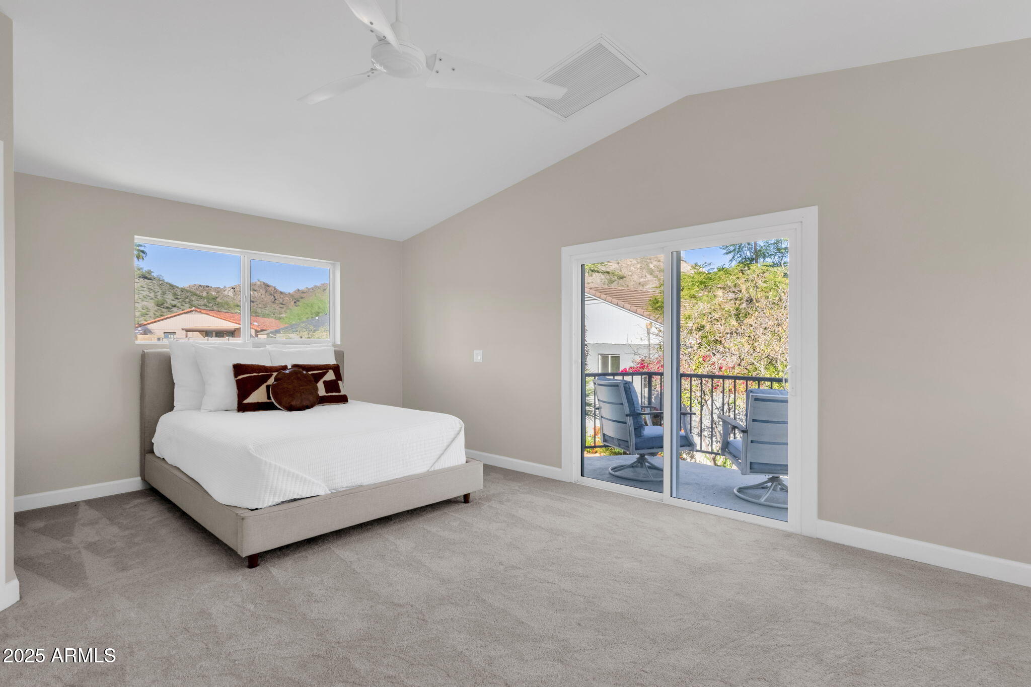 2276 East Mercer Lane Phoenix, AZ 85028 - Photo 37 of 61 a room with a bed and a window