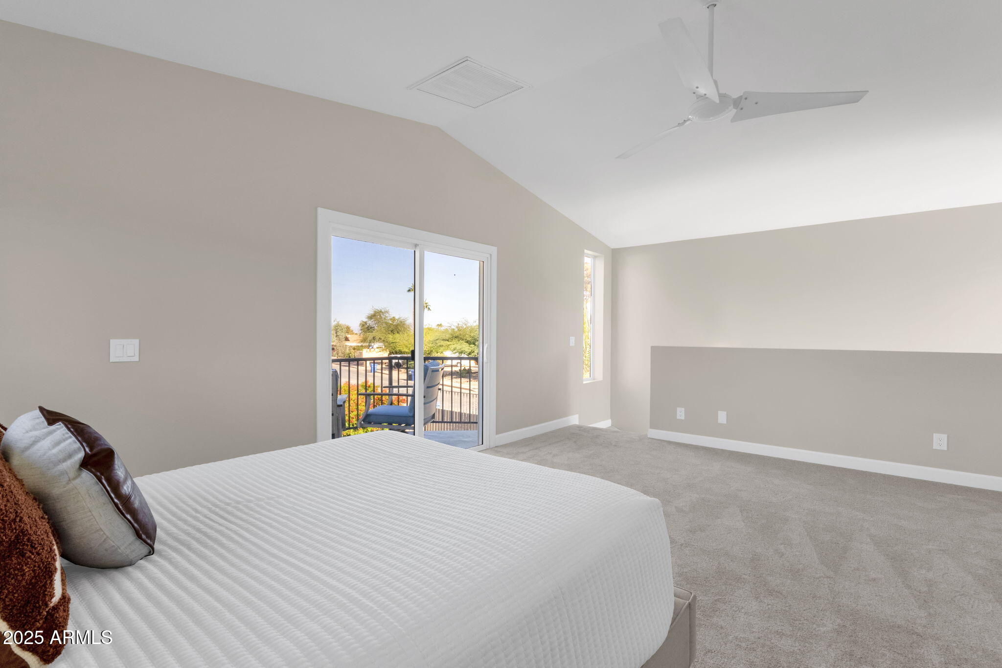 2276 East Mercer Lane Phoenix, AZ 85028 - Photo 38 of 61 a bedroom with a bed and a window