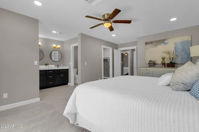 a view of a house with swimming pool and sitting area