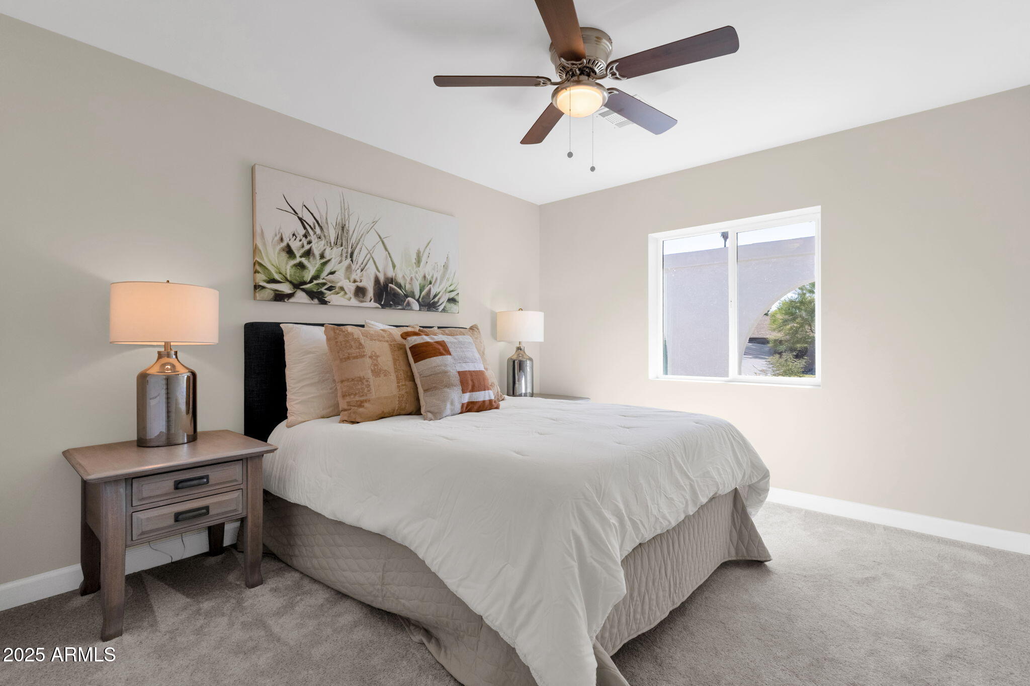 2276 East Mercer Lane Phoenix, AZ 85028 - Photo 42 of 61 a bedroom with bed and window