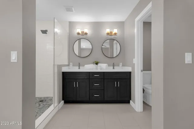 a view of a house with swimming pool and sitting area