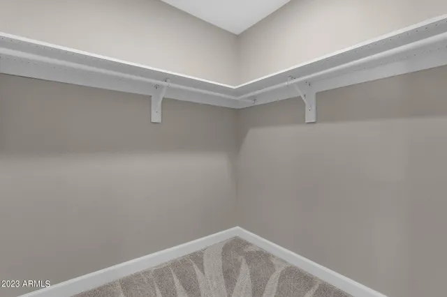 a view of a house with swimming pool yard and sitting area