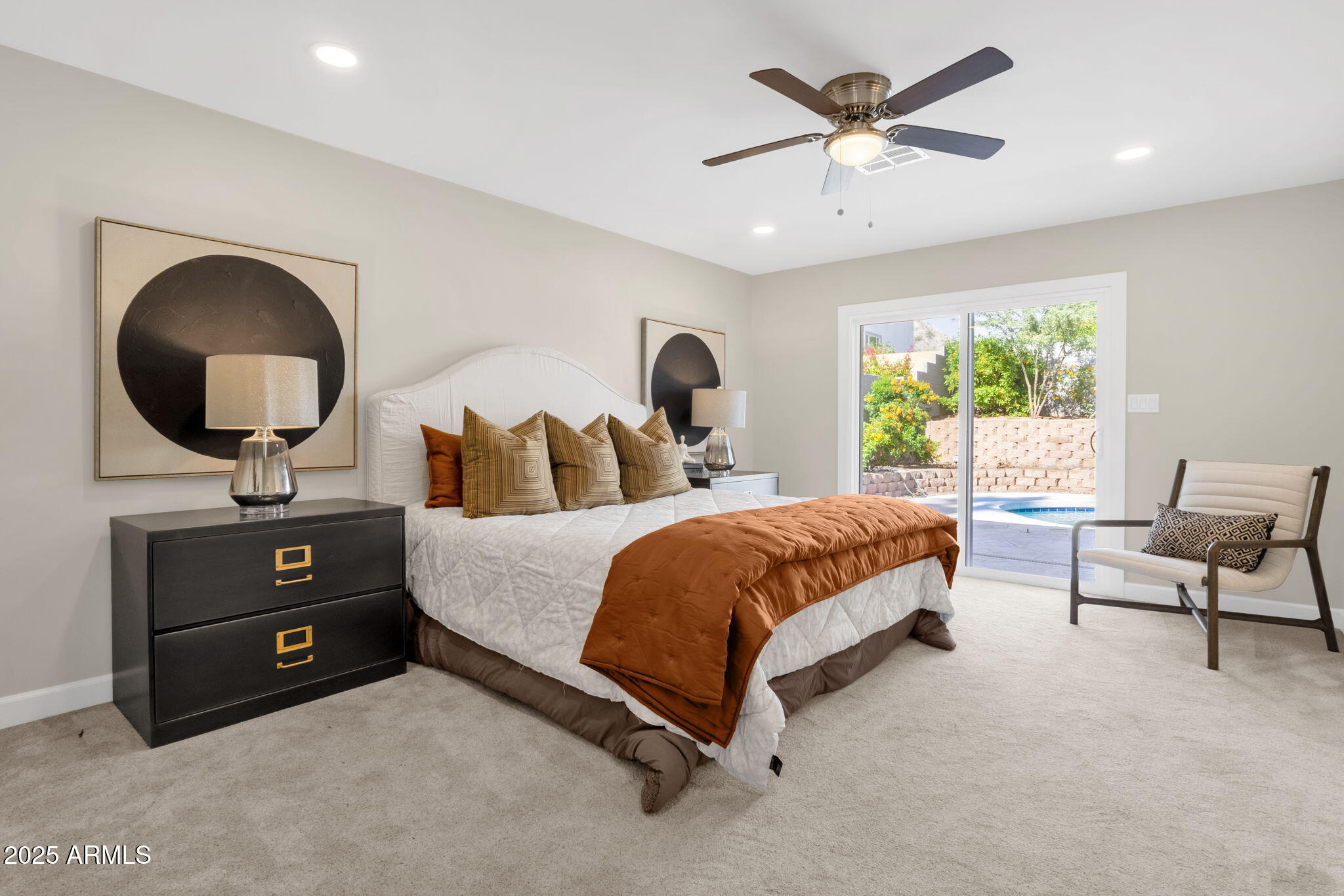 2276 East Mercer Lane Phoenix, AZ 85028 - Photo 46 of 61 a bedroom with a bed and window