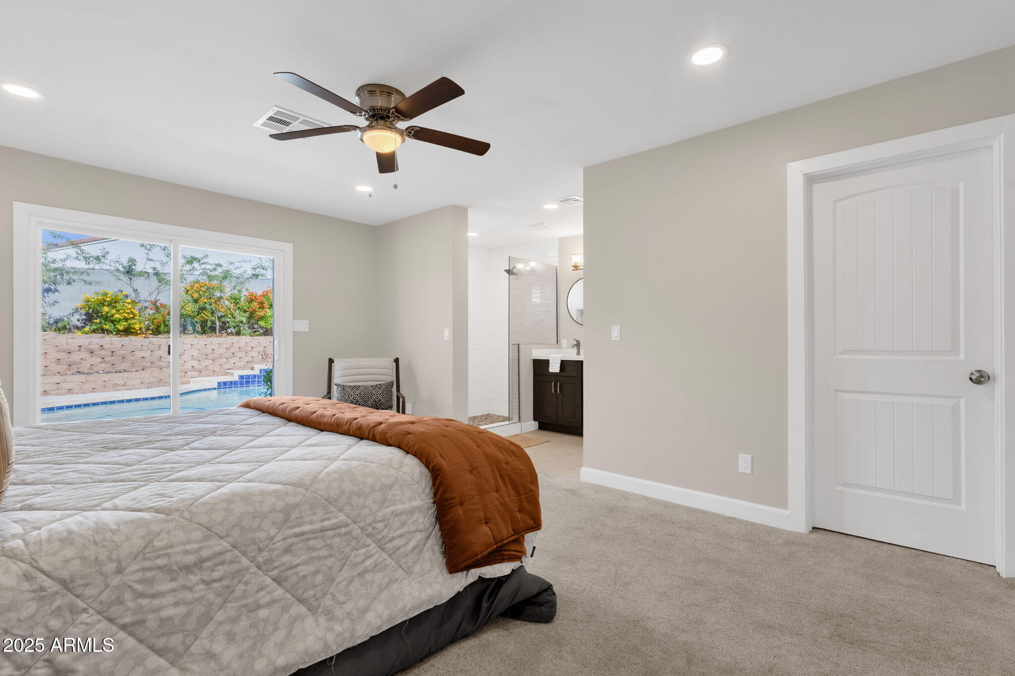 2276 East Mercer Lane Phoenix, AZ 85028 - Photo 48 of 61 a bedroom with a bed and window