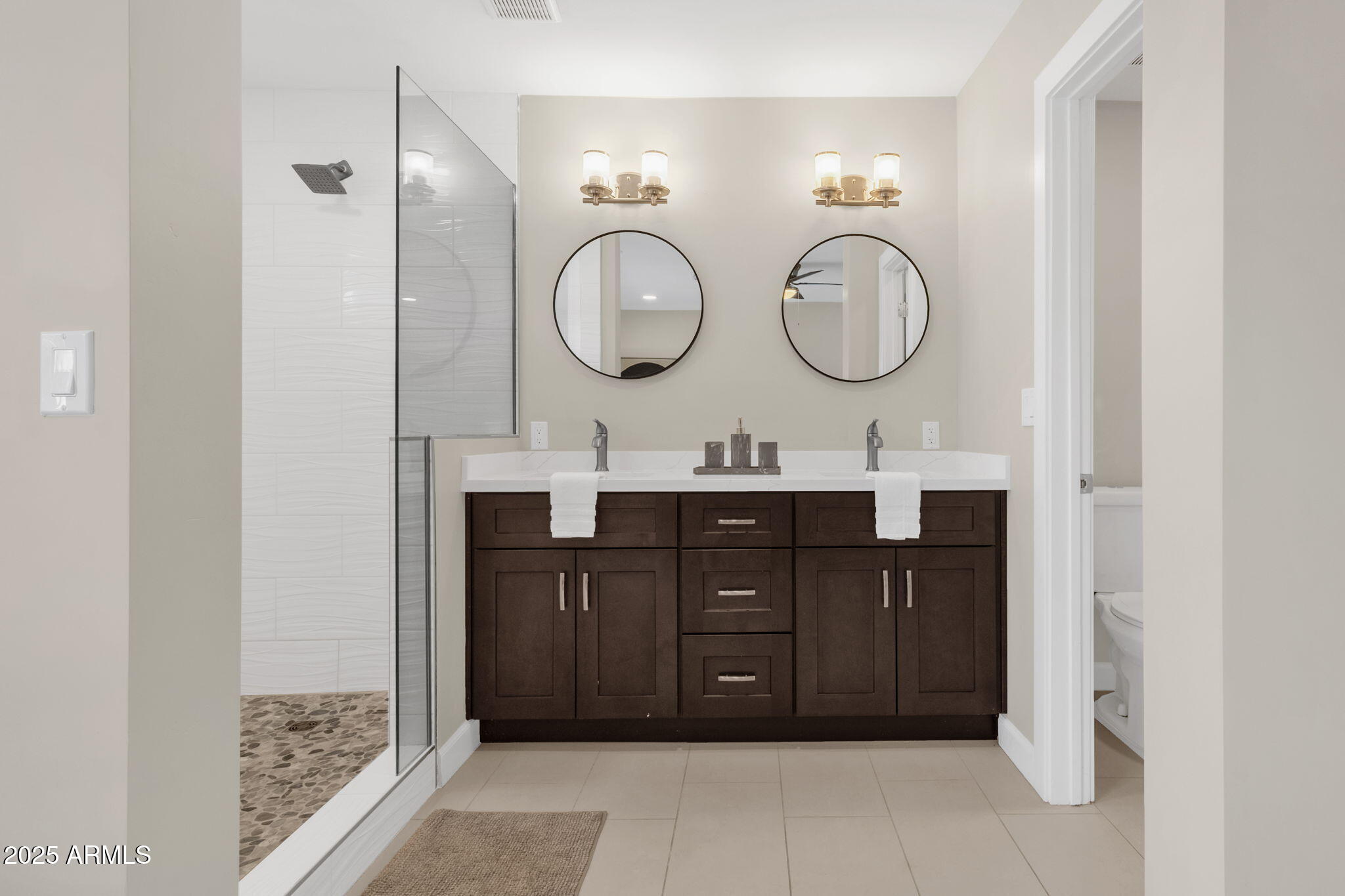 2276 East Mercer Lane Phoenix, AZ 85028 - Photo 50 of 61 a living room with two mirror and a clock
