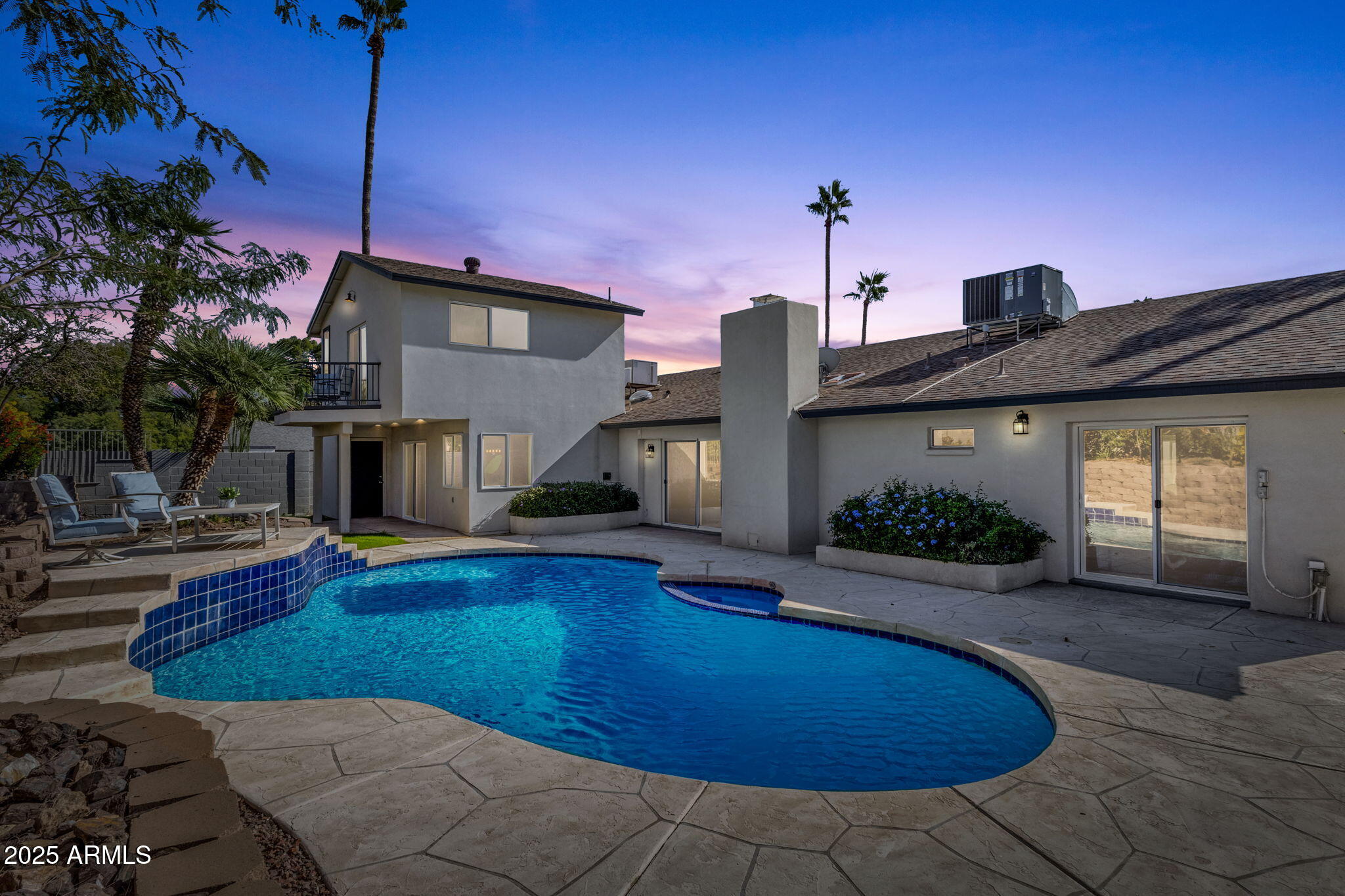 2276 East Mercer Lane Phoenix, AZ 85028 - Photo 59 of 61 a view of a house with swimming pool
