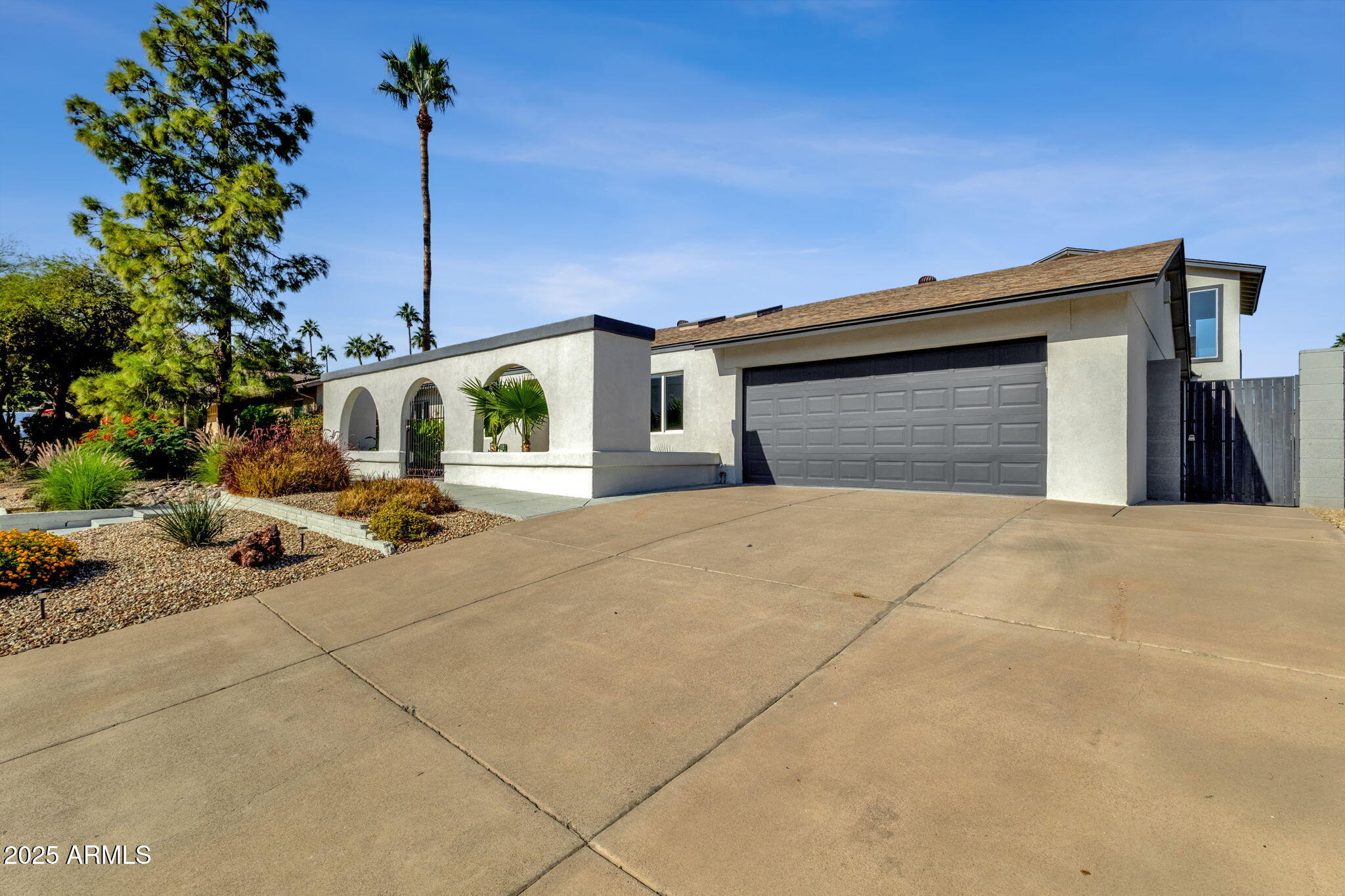 2276 East Mercer Lane Phoenix, AZ 85028 - Photo 6 of 61 a house view with a backyard space