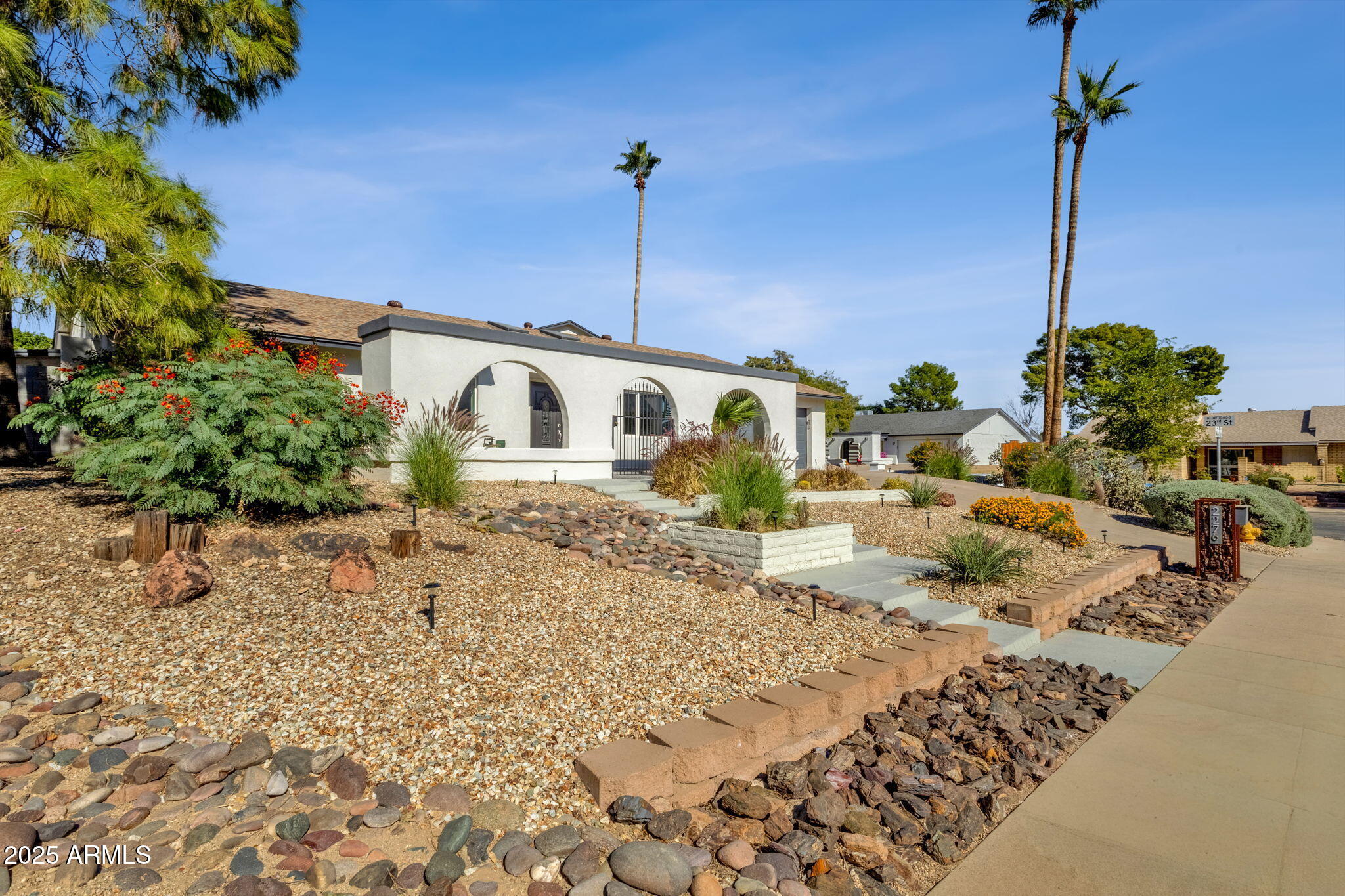 2276 East Mercer Lane Phoenix, AZ 85028 - Photo 8 of 61 a house view with a outdoor space