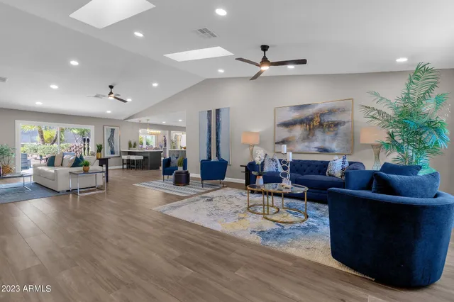 a living room with furniture and a window