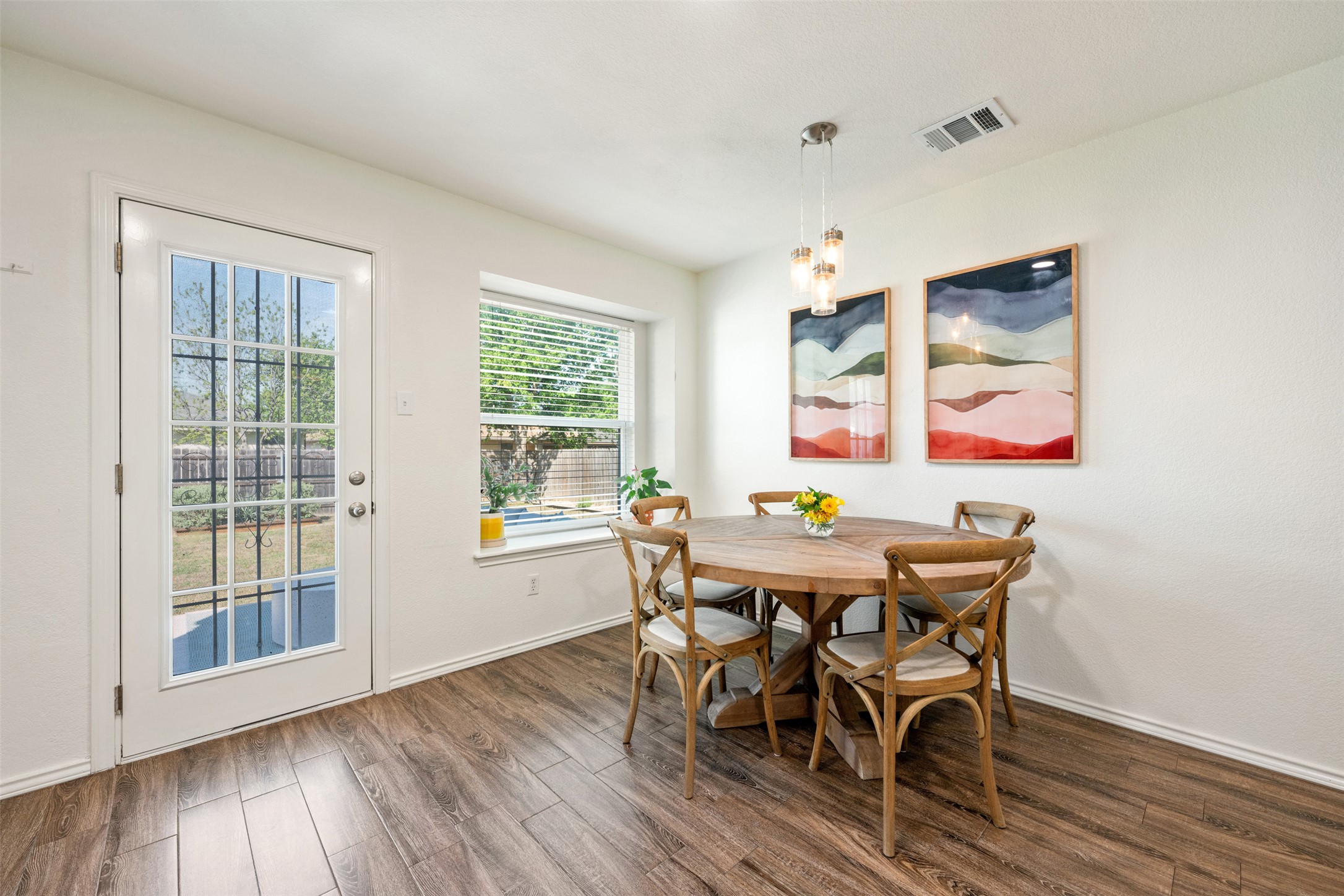 3116 Port Anne Way Leander, TX 78641 - Photo 9 of 24 Dining space with view into the backyard.