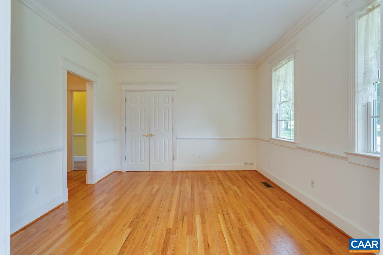 1904 Beaver Ridge Road Crozet, VA 22932 - Photo 13 of 70 a view of a room with wooden floor and brick walls