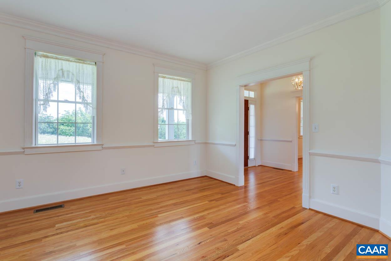 1904 Beaver Ridge Road Crozet, VA 22932 - Photo 14 of 70 an empty room with wooden floor and windows