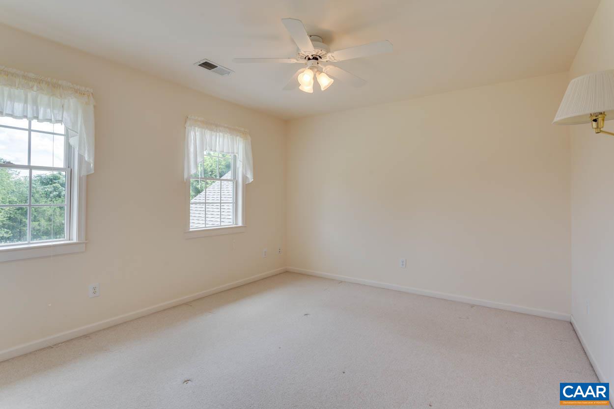 1904 Beaver Ridge Road Crozet, VA 22932 - Photo 34 of 70 an empty room with a window and a fan