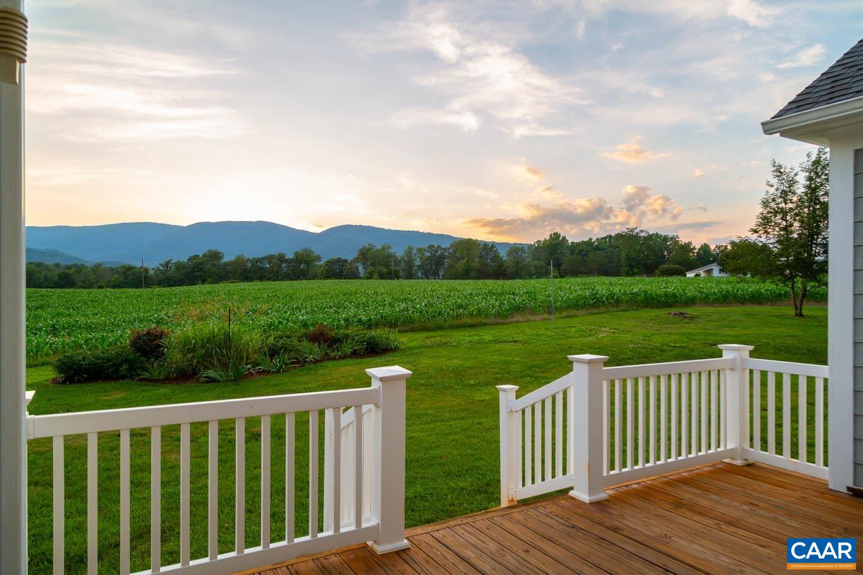 1904 Beaver Ridge Road Crozet, VA 22932 - Photo 4 of 70 a view of a wooden deck and a yard with seating space