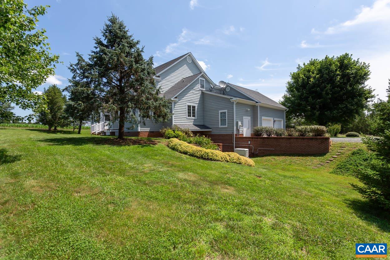 1904 Beaver Ridge Road Crozet, VA 22932 - Photo 54 of 70 a view of a house with backyard and porch