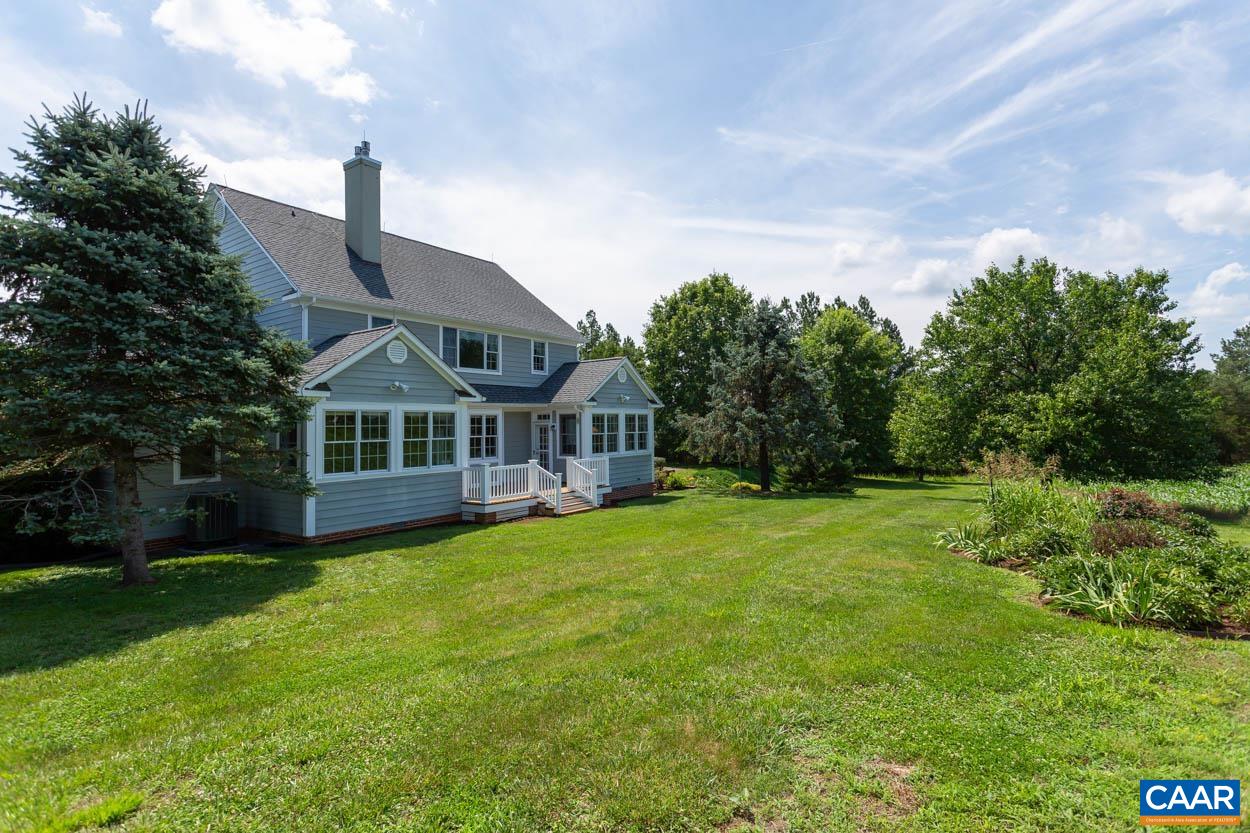 1904 Beaver Ridge Road Crozet, VA 22932 - Photo 56 of 70 a front view of a house with garden
