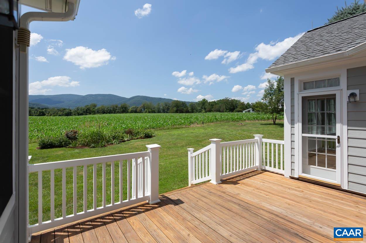 1904 Beaver Ridge Road Crozet, VA 22932 - Photo 57 of 70 a view of balcony with hardwood floor and lake view