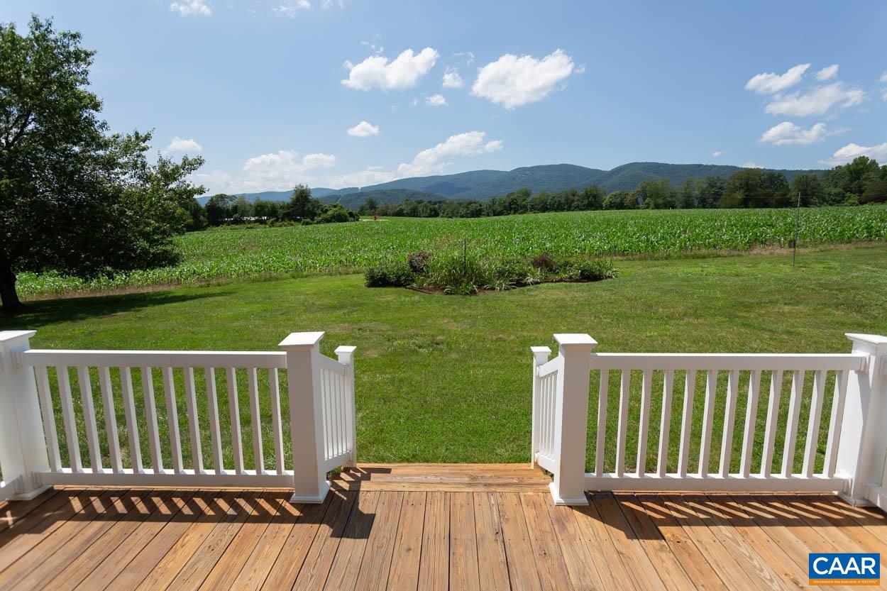 1904 Beaver Ridge Road Crozet, VA 22932 - Photo 58 of 70 a view of a deck and yard with green space