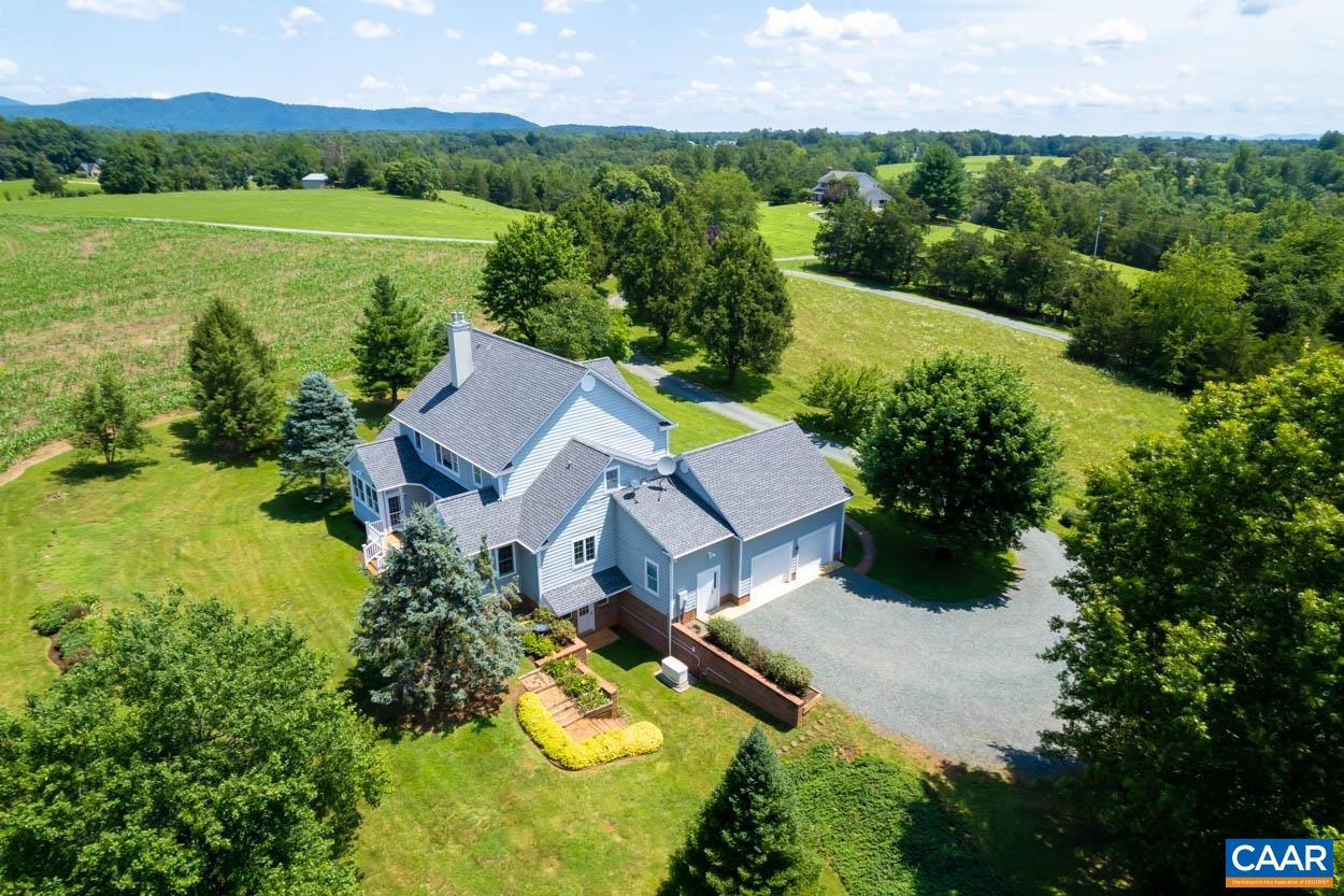 1904 Beaver Ridge Road Crozet, VA 22932 - Photo 64 of 70 an aerial view of a house with garden space and outdoor seating