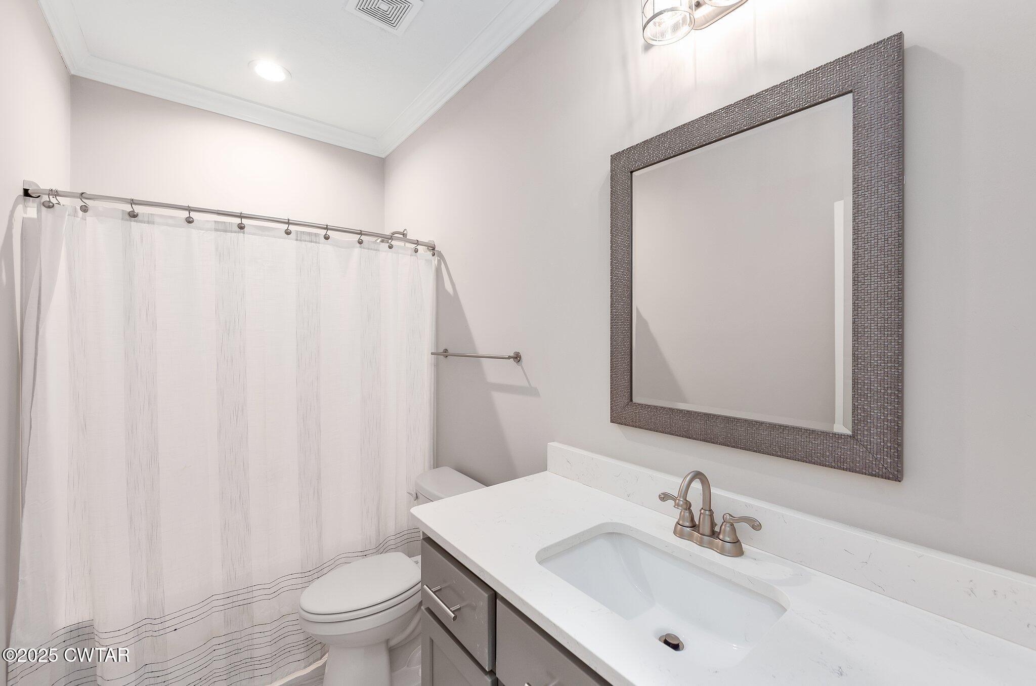 42 Lancaster Cove Jackson, TN 38305 - Photo 32 of 44 a bathroom with a sink toilet and shower