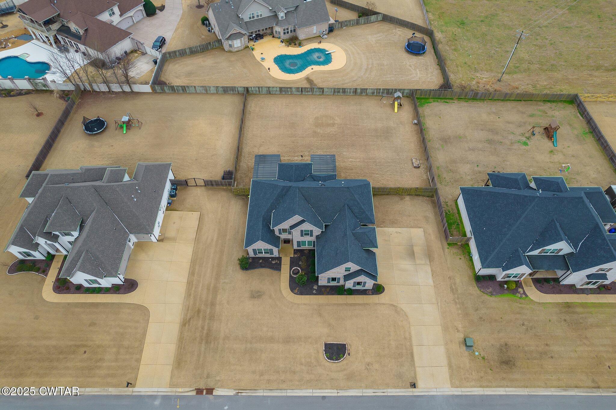 42 Lancaster Cove Jackson, TN 38305 - Photo 39 of 44 an aerial view of a house with swimming pool