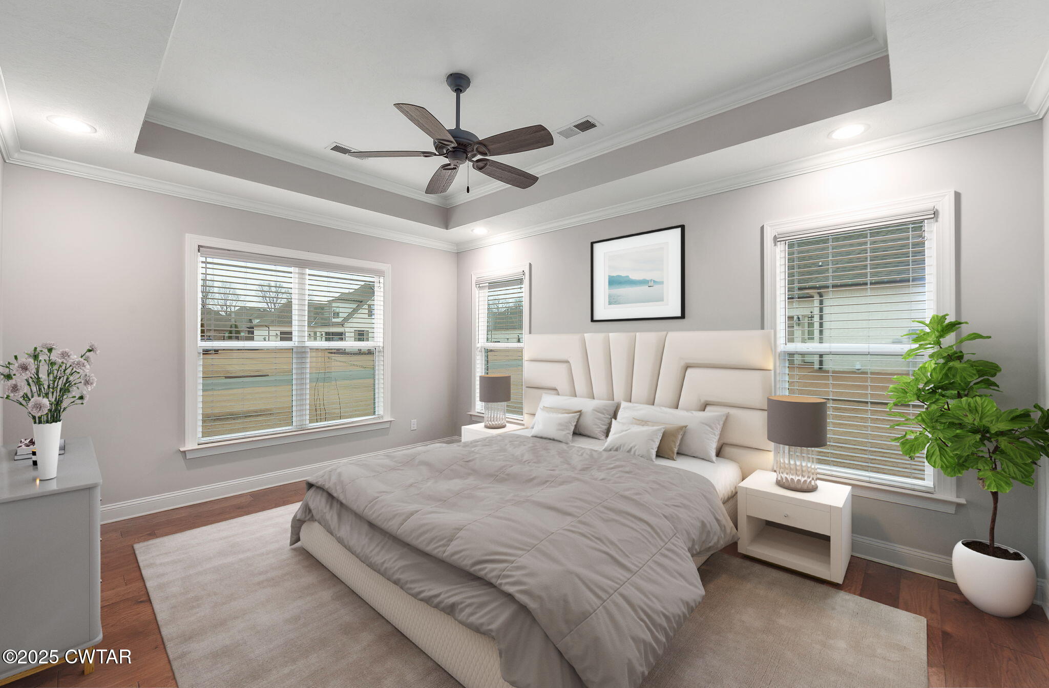 42 Lancaster Cove Jackson, TN 38305 - Photo 4 of 44 a bedroom with a large bed potted plant and a window