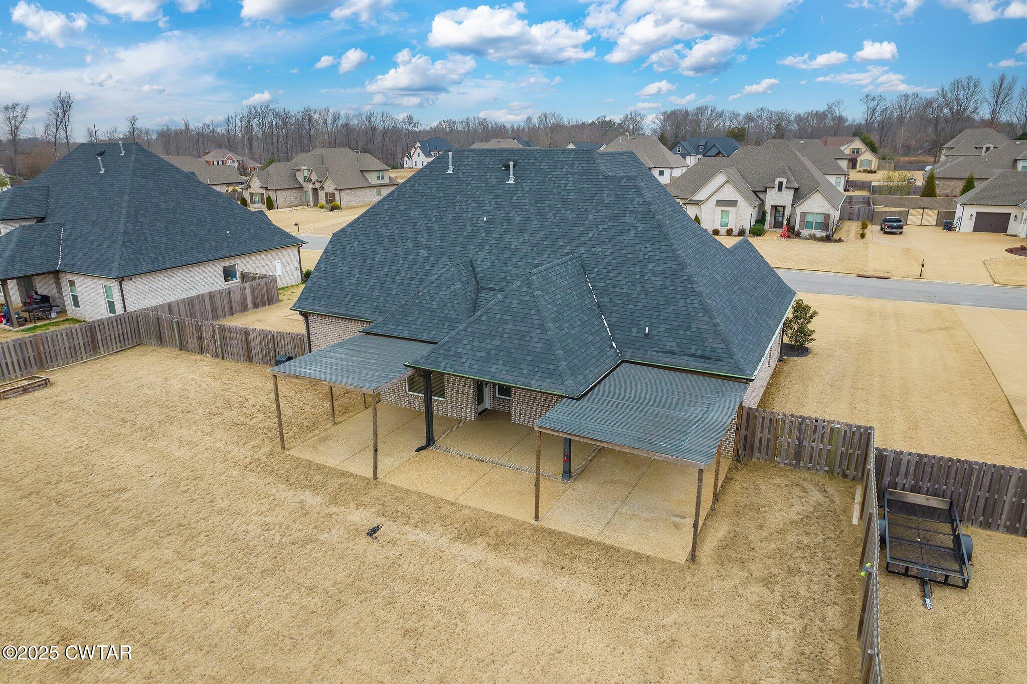 42 Lancaster Cove Jackson, TN 38305 - Photo 41 of 44 an aerial view of a house with swimming pool and sitting space