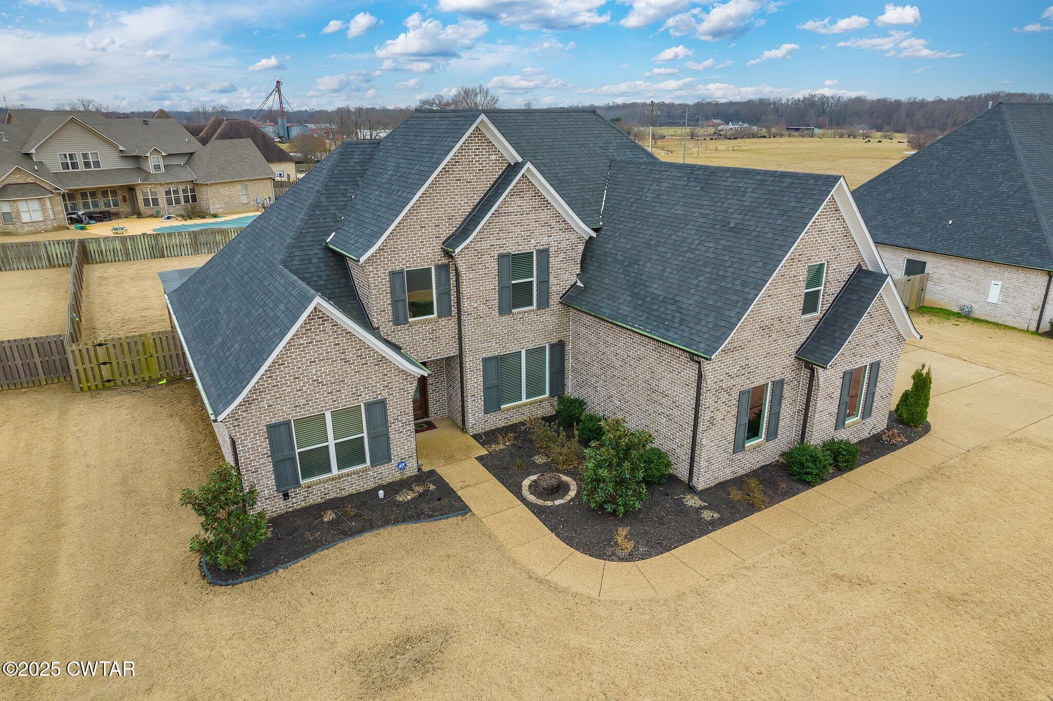 42 Lancaster Cove Jackson, TN 38305 - Photo 43 of 44 an aerial view of a house with a yard