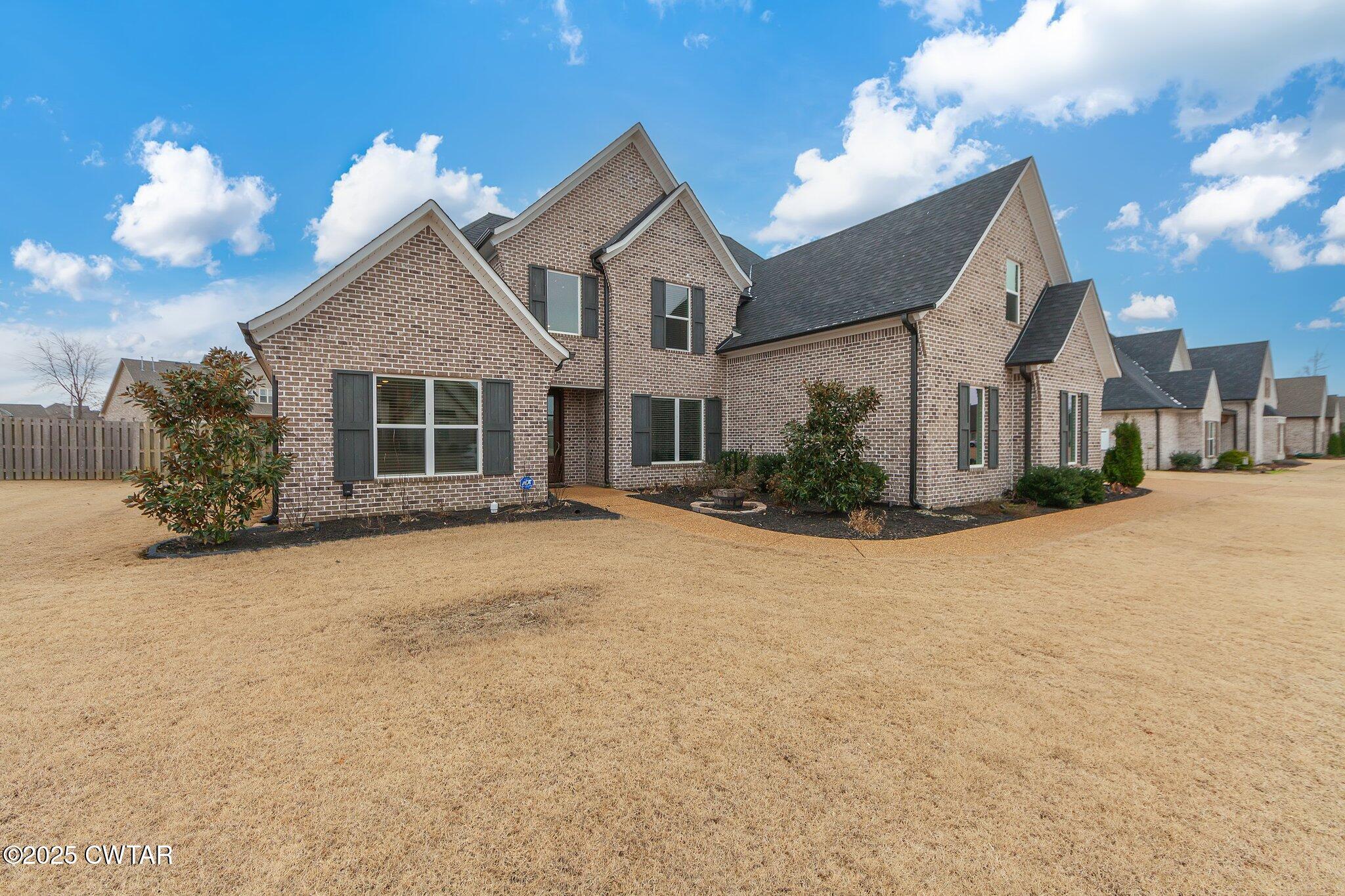 42 Lancaster Cove Jackson, TN 38305 - Photo 44 of 44 a view of a house with a yard