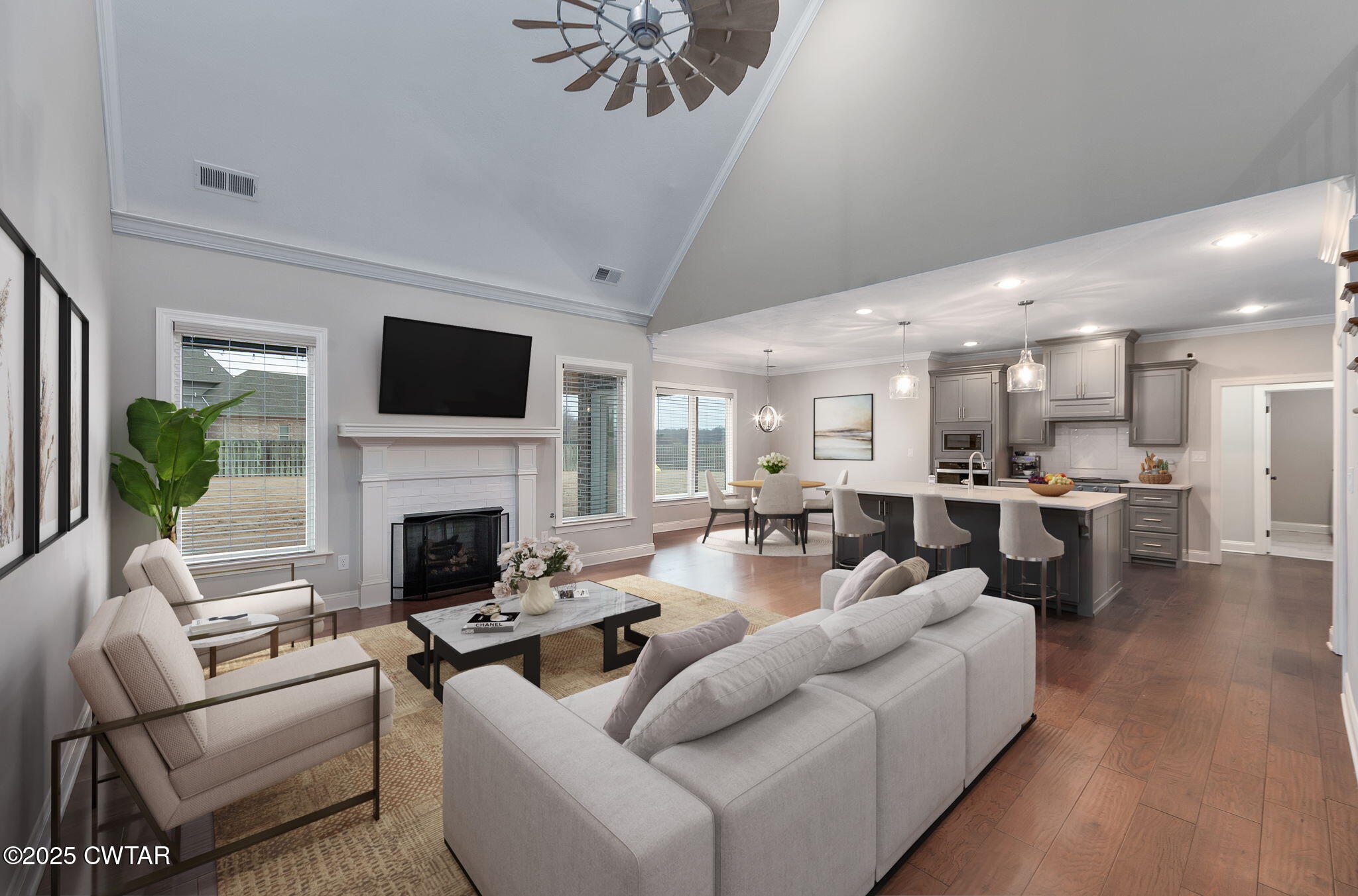 42 Lancaster Cove Jackson, TN 38305 - Photo 5 of 44 a living room with furniture a fireplace and a flat screen tv