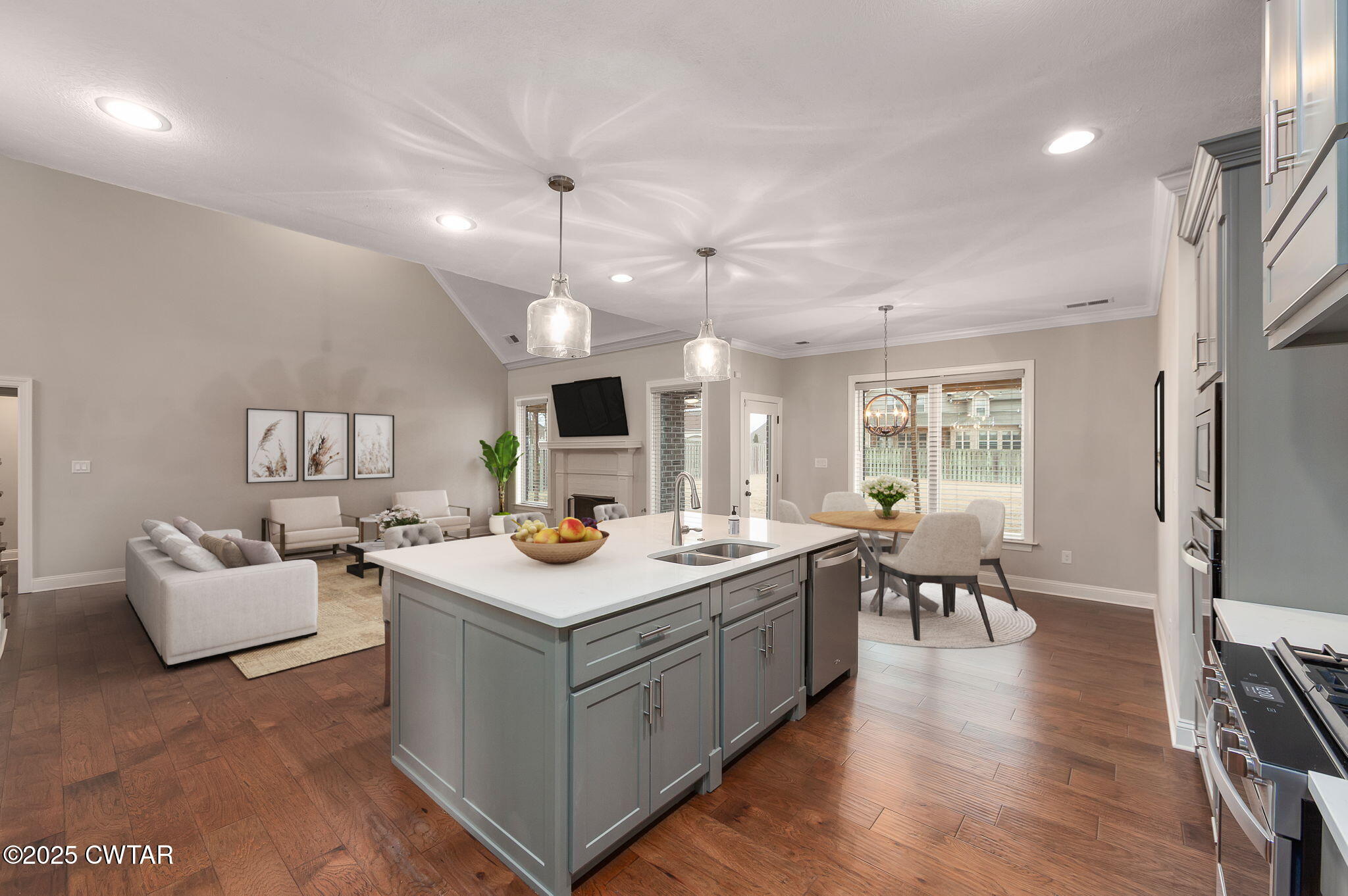 42 Lancaster Cove Jackson, TN 38305 - Photo 8 of 44 a view of living room with granite countertop furniture and a wooden floor