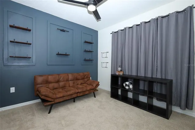 a view of room with flat screen tv