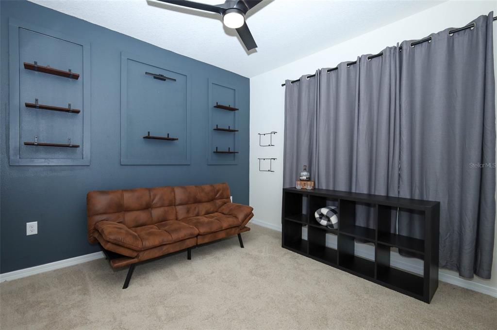 33417 Affirmed Way Sorrento, FL 32776 - Photo 22 of 43 a living room with furniture and a wooden floor