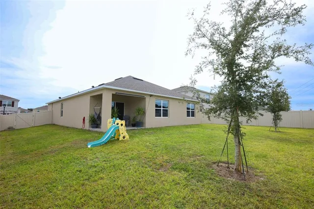 a view of a lake with a big yard