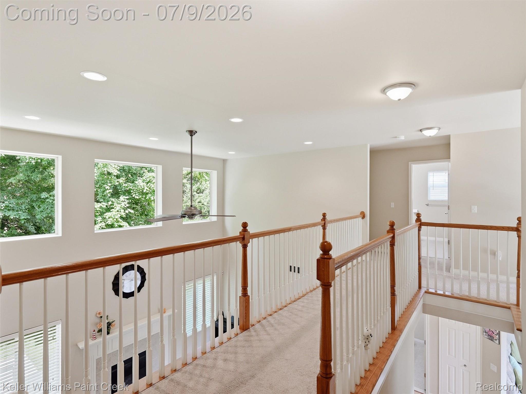 846 Monterey Ln. Rochester, MI 48307 - Photo 20 of 52 Open loft area with carpeted flooring, wood and white baluster railing, and recessed lighting