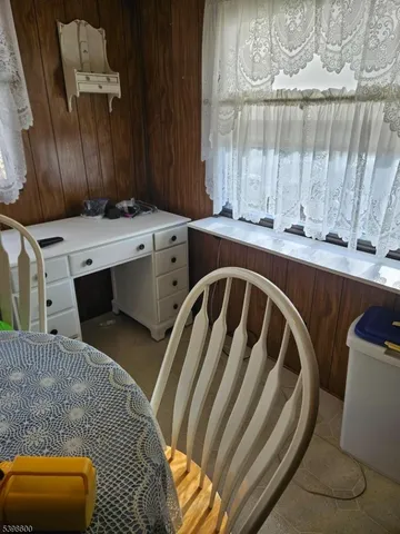 a kitchen with a sink and a washer dryer