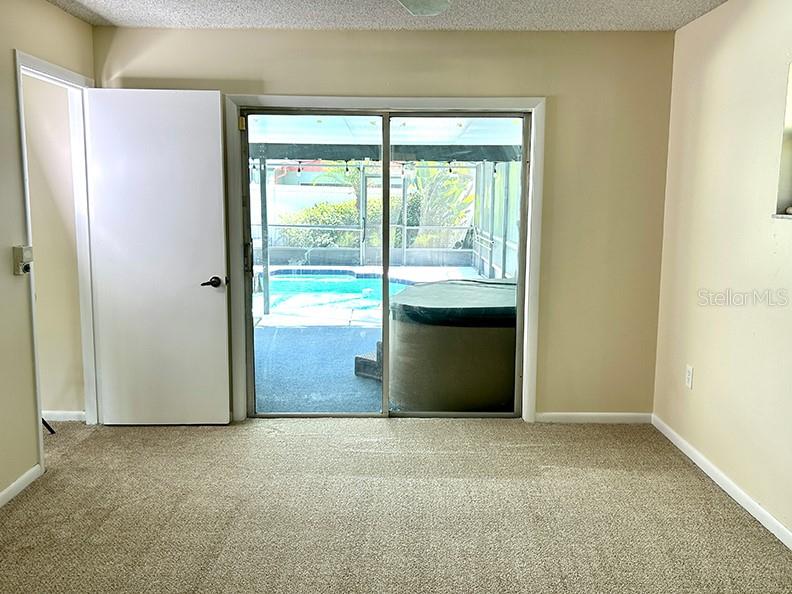 4791 Deer Road Orlando, FL 32812 - Photo 17 of 35 a view of an empty room with a window