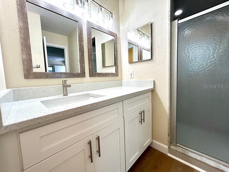 4791 Deer Road Orlando, FL 32812 - Photo 18 of 35 a bathroom with a sink and a mirror