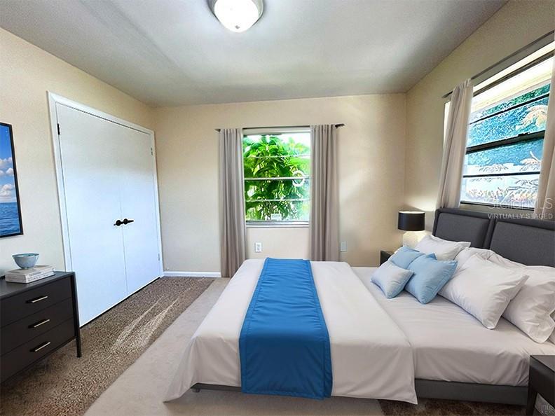 4791 Deer Road Orlando, FL 32812 - Photo 21 of 35 a bedroom with a bed and a window