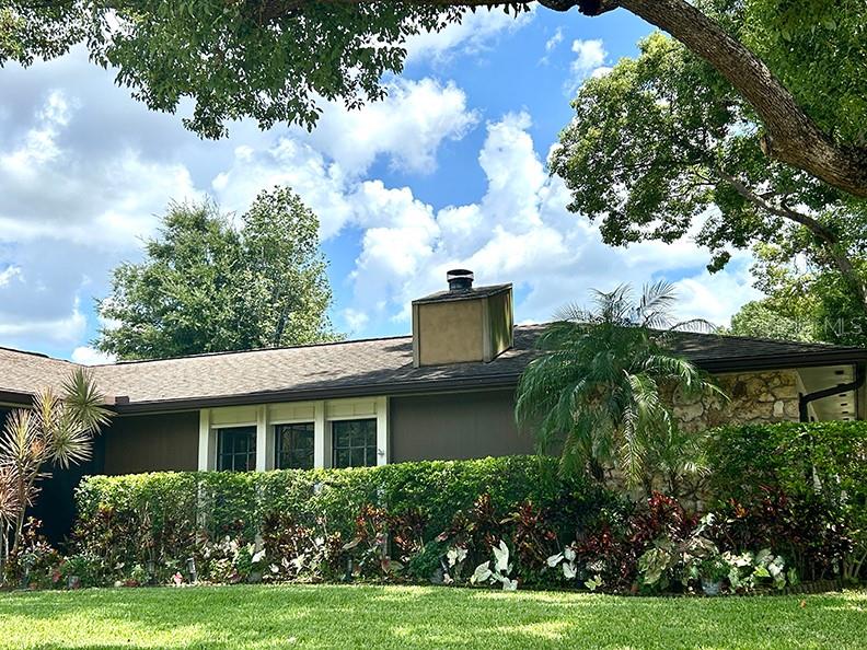 4791 Deer Road Orlando, FL 32812 - Photo 34 of 35 a front view of a house with garden