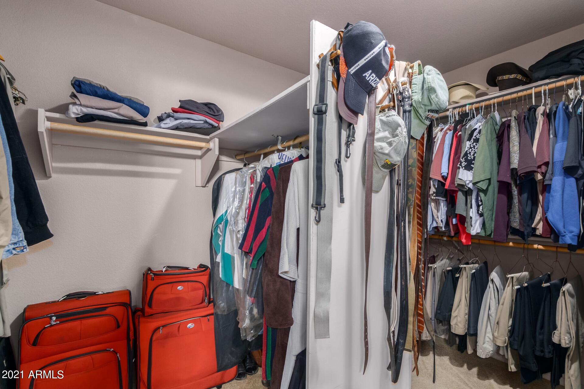 216 West Smoke Tree Road Gilbert, AZ 85233 - Photo 30 of 55 Dual Sided Grand Primary Walk-In Closet