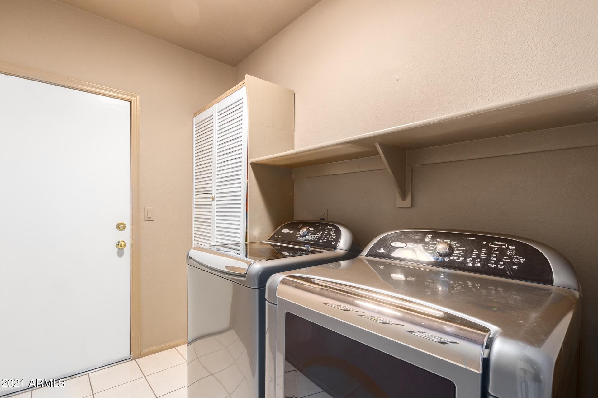 216 West Smoke Tree Road Gilbert, AZ 85233 - Photo 34 of 55 Large Laundry Room with Cabinet Space