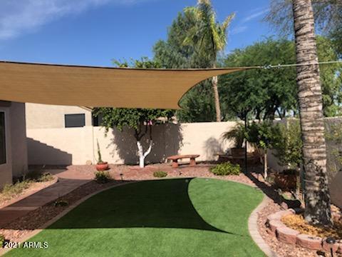 216 West Smoke Tree Road Gilbert, AZ 85233 - Photo 43 of 55 Shade Sail conveys
