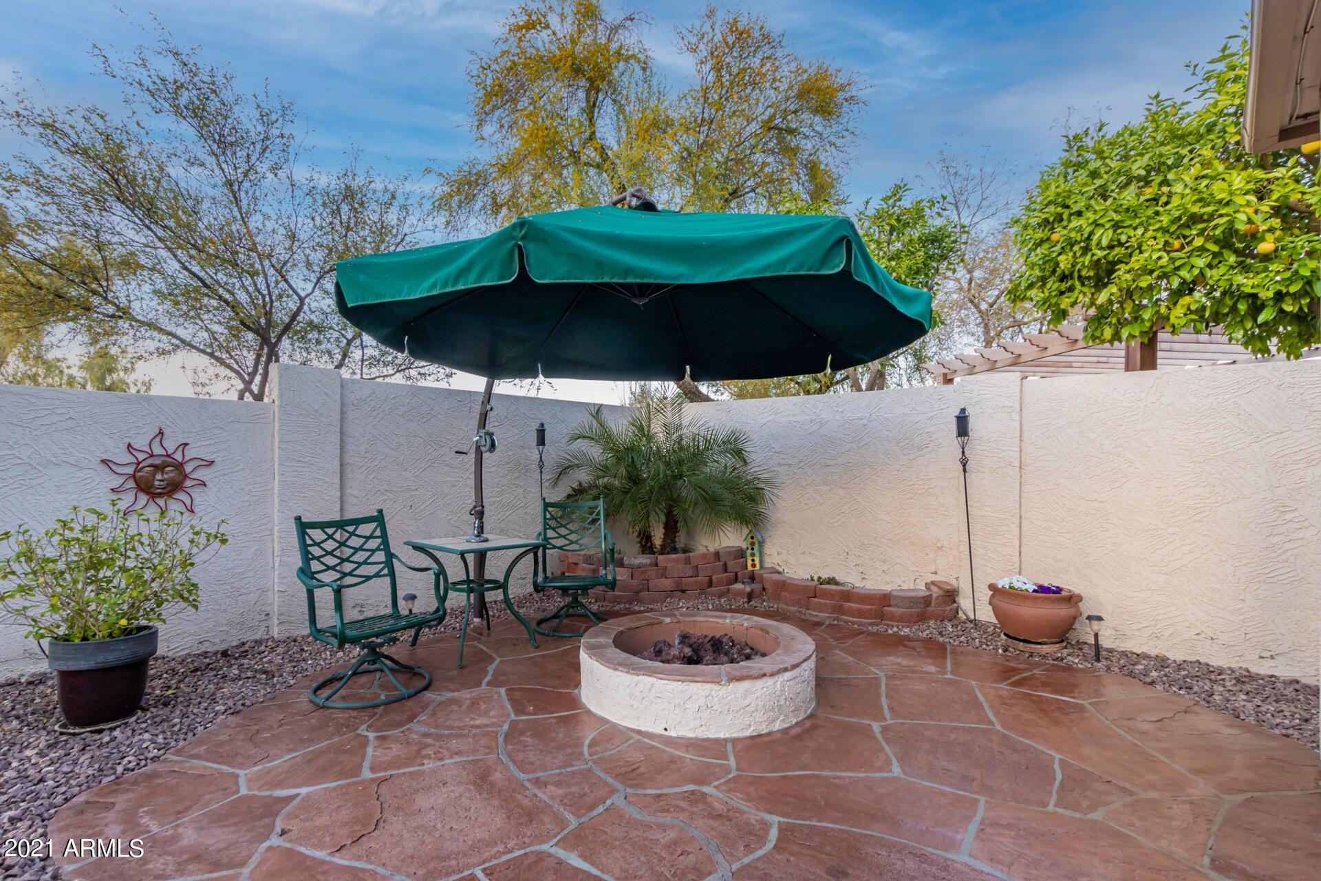 216 West Smoke Tree Road Gilbert, AZ 85233 - Photo 44 of 55 Built-In Heavy Duty Umbrella conveys