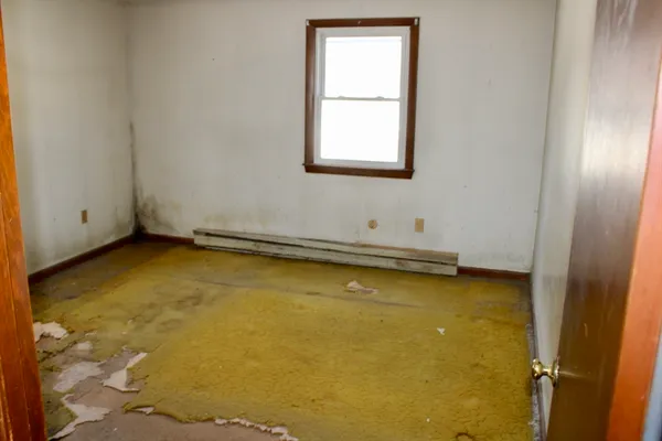 an empty room with a window