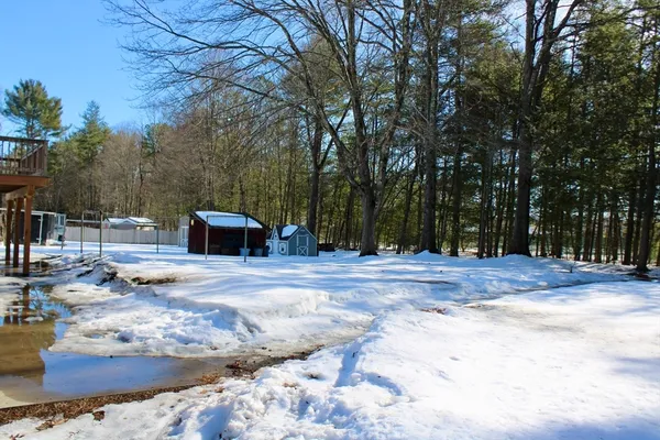 a view of a patio with a yard